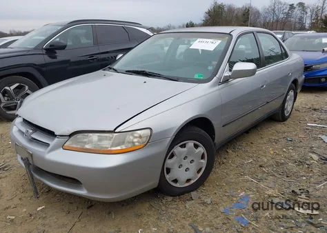 2000 Honda Accord 2.3 Lx from USA, damaged, VIN 1HGCG6653YA133308